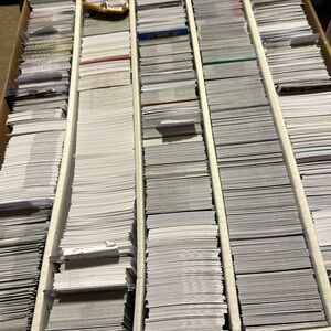 about 2500 cards mix of baseball football hockey a lot of collegea lot of color!